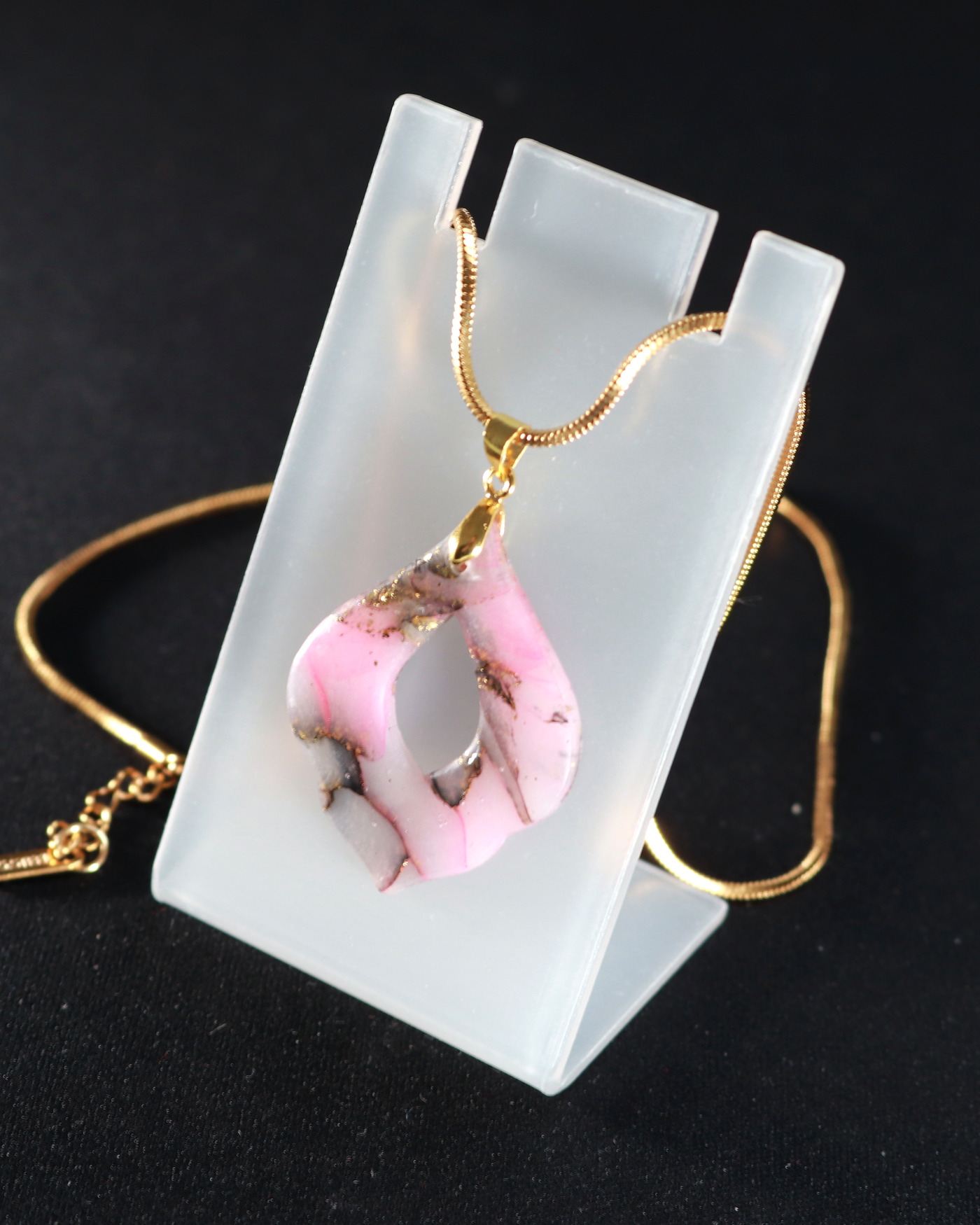 Rose smoke pendant necklace in a tall editorial crop